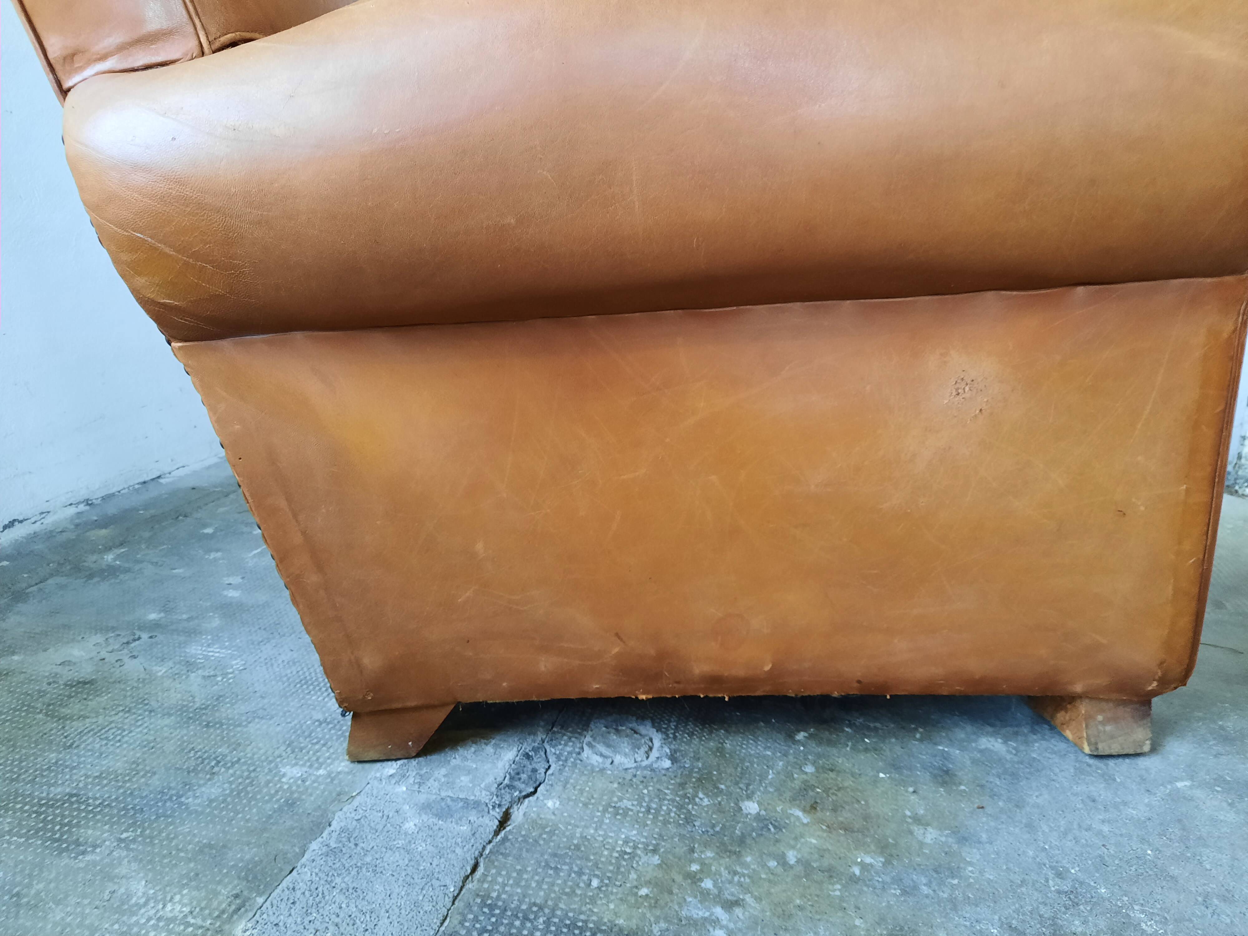 Old leather club chair 1940-1950