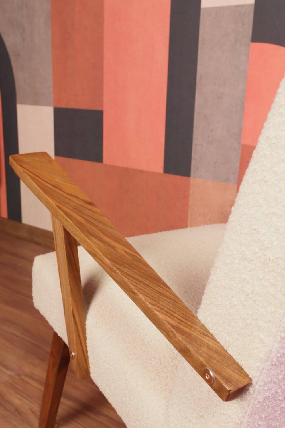 Vintage beige bouclé armchair with walnut wood from the 1950s.