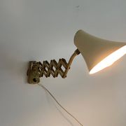 Cream metal and brass wall lamp with scissors design by Karl Lang for SIS Licht, 1950s, Germany.
