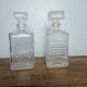 Mismatched pair of whisky decanters.