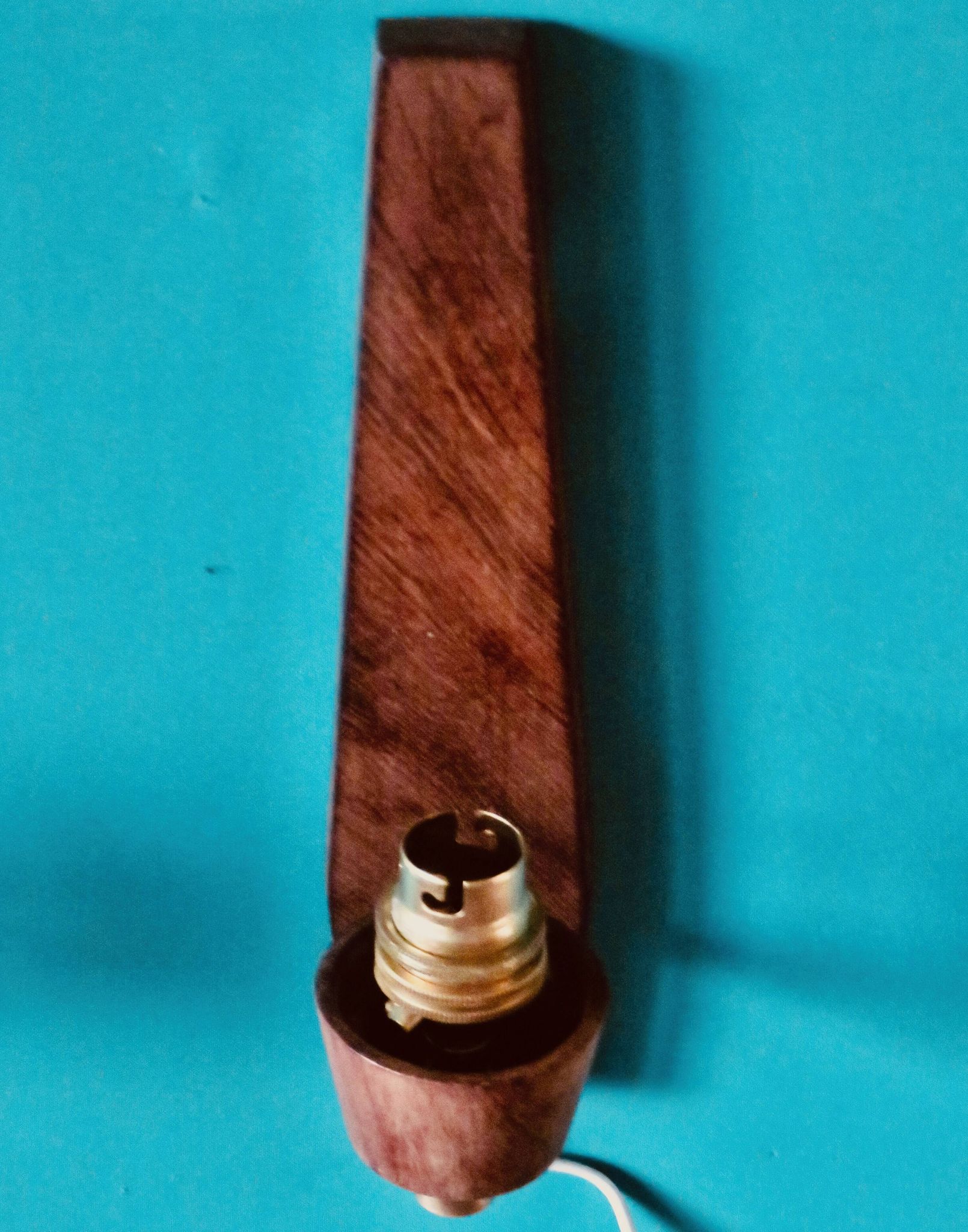 Pair of "Vitrika" rosewood wall sconces with turquoise shades. Denmark, 1960