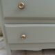 1950s commode enhanced in verdigris.