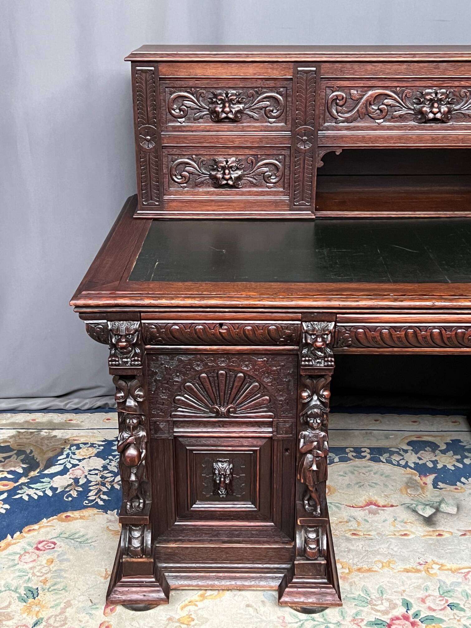 Old Renaissance style desk. Solid oak. France. Late 19th century.