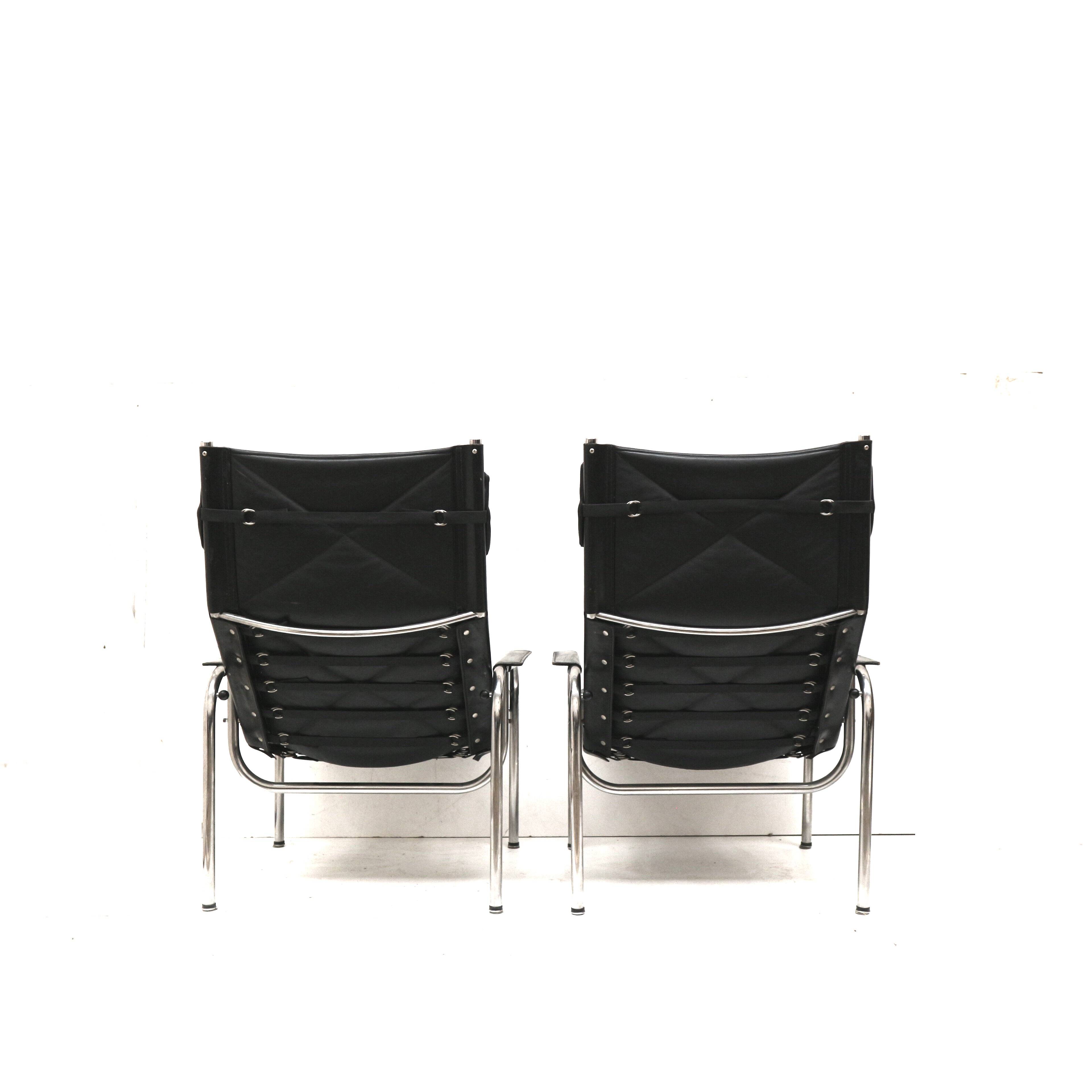 2x Vintage black leather armchair by Strässle HE1106 designed by Hans Eichenberger