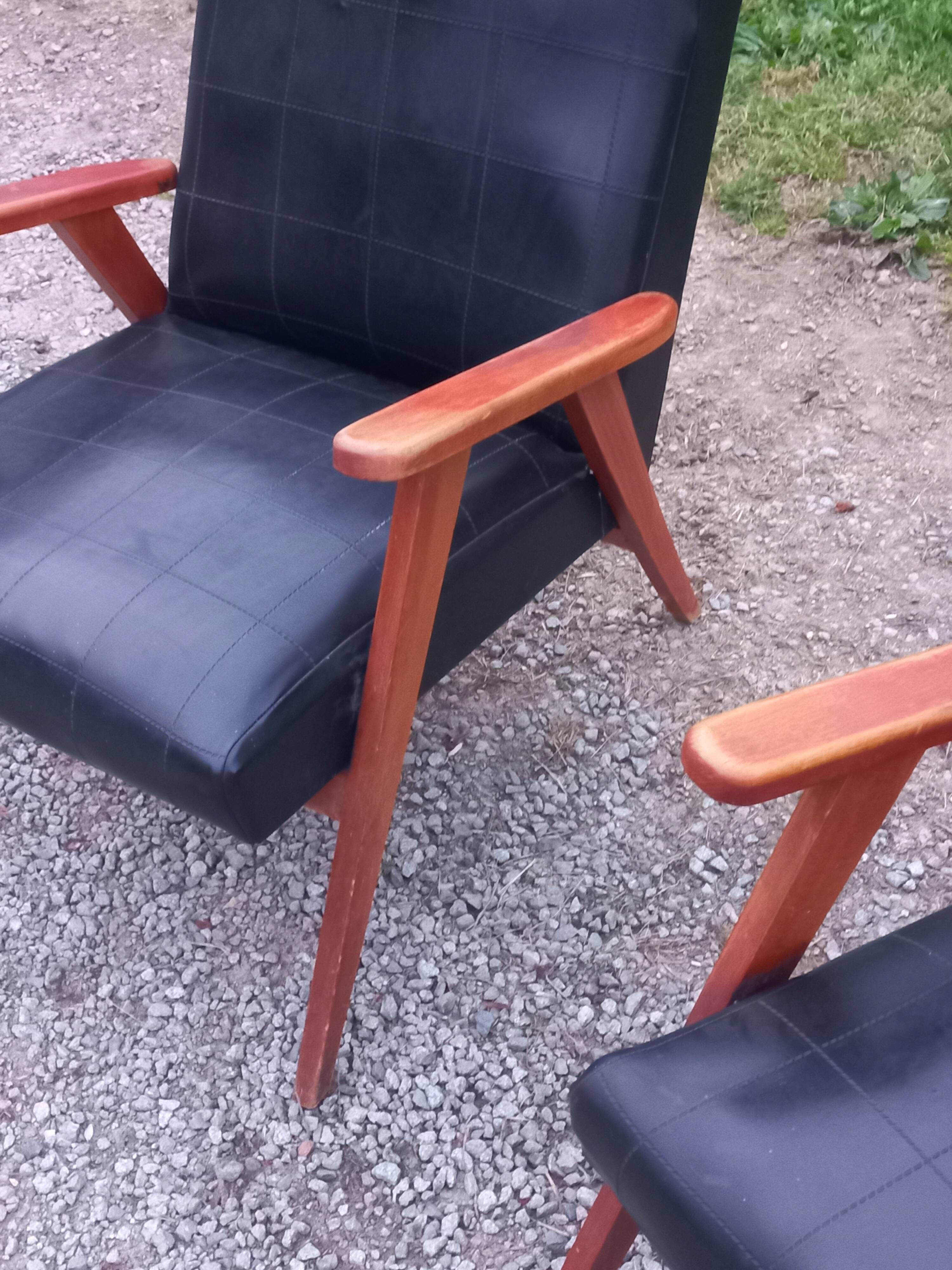 Pair of vintage beech armchairs feet compass covered with black moleskine from the 50s