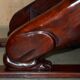 Pair of hardwood library steps with carved dogs, Regency style.