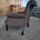 Buttoned armchair