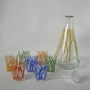 Colorful designer set composed of 7 liqueur glasses and a seventies 70s carafe