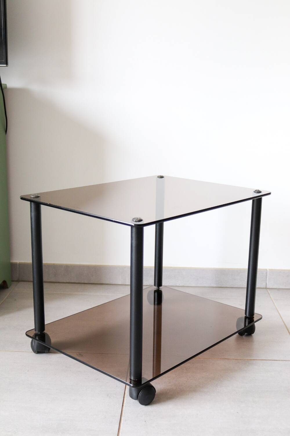 Erard tempered glass coffee table on wheels
