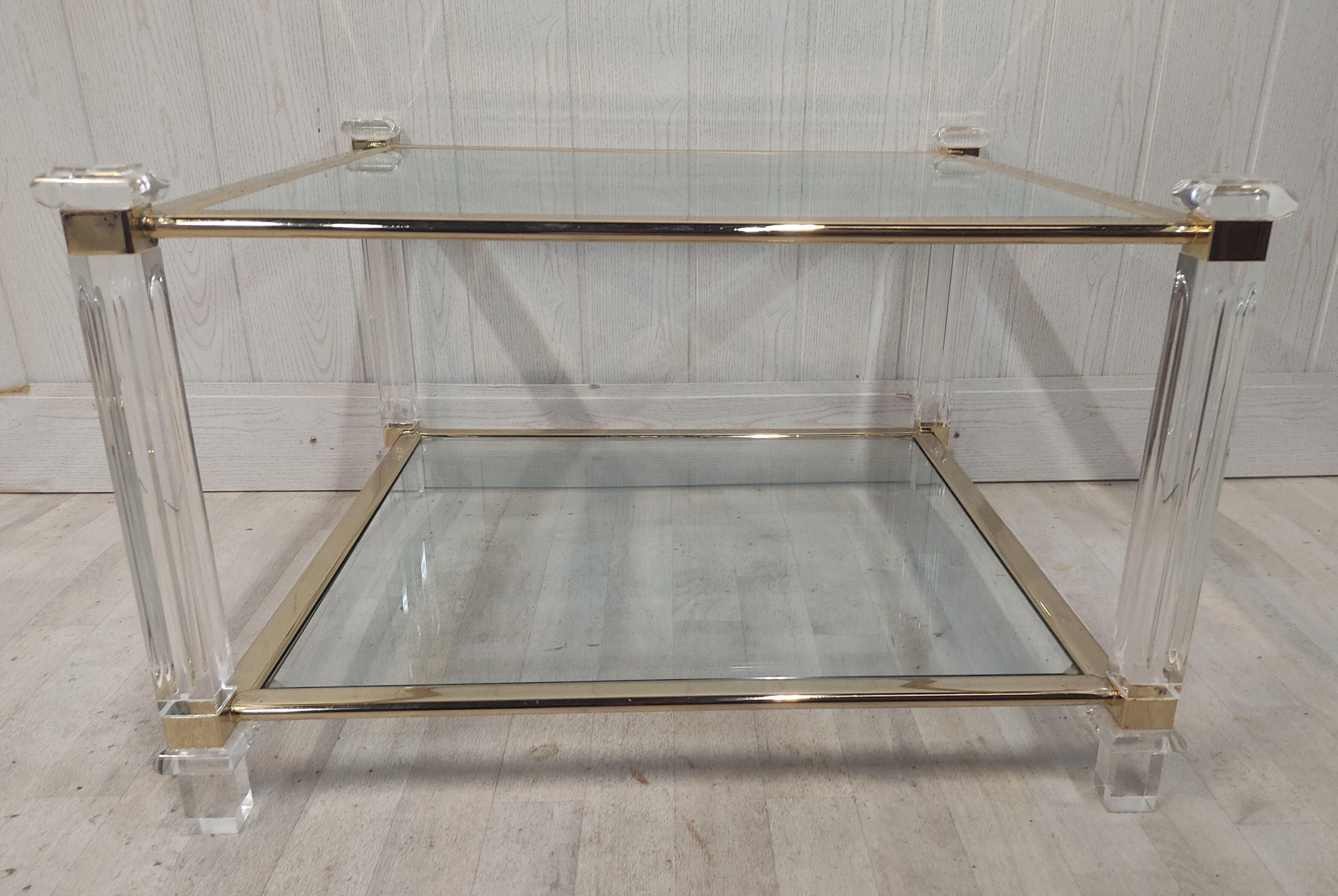 Brass coffee table, beveled glass and altuglas