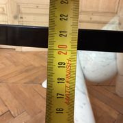Dining table with glass top and marble base, Ligne Roset.