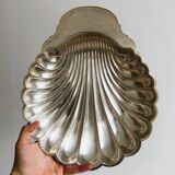 large silver-plated metal shell-shaped dish