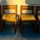4 vintage chairs made of solid wood and woven straw