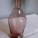 Blown glass vase moves purple