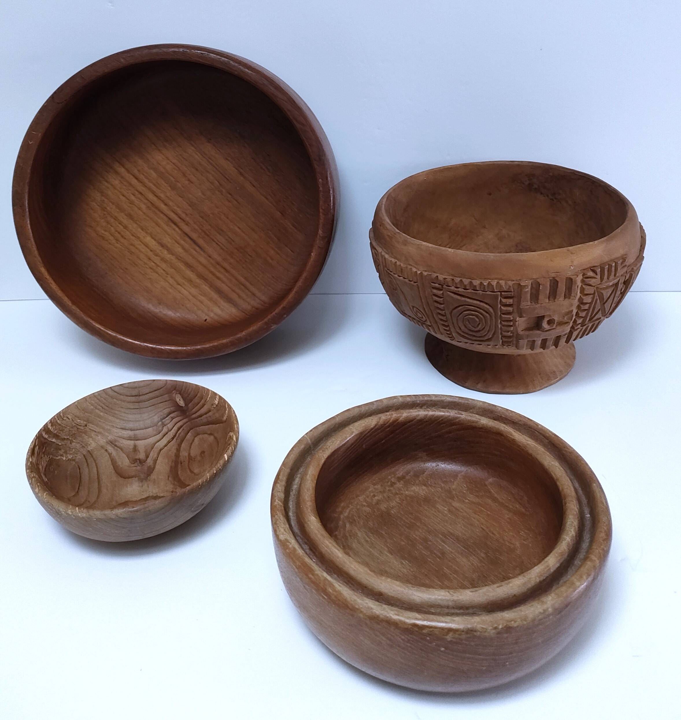 four vintage solid wood bowls