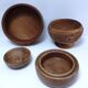 four vintage solid wood bowls