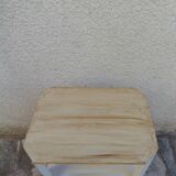 Beige vintage side tables, wooden tops.