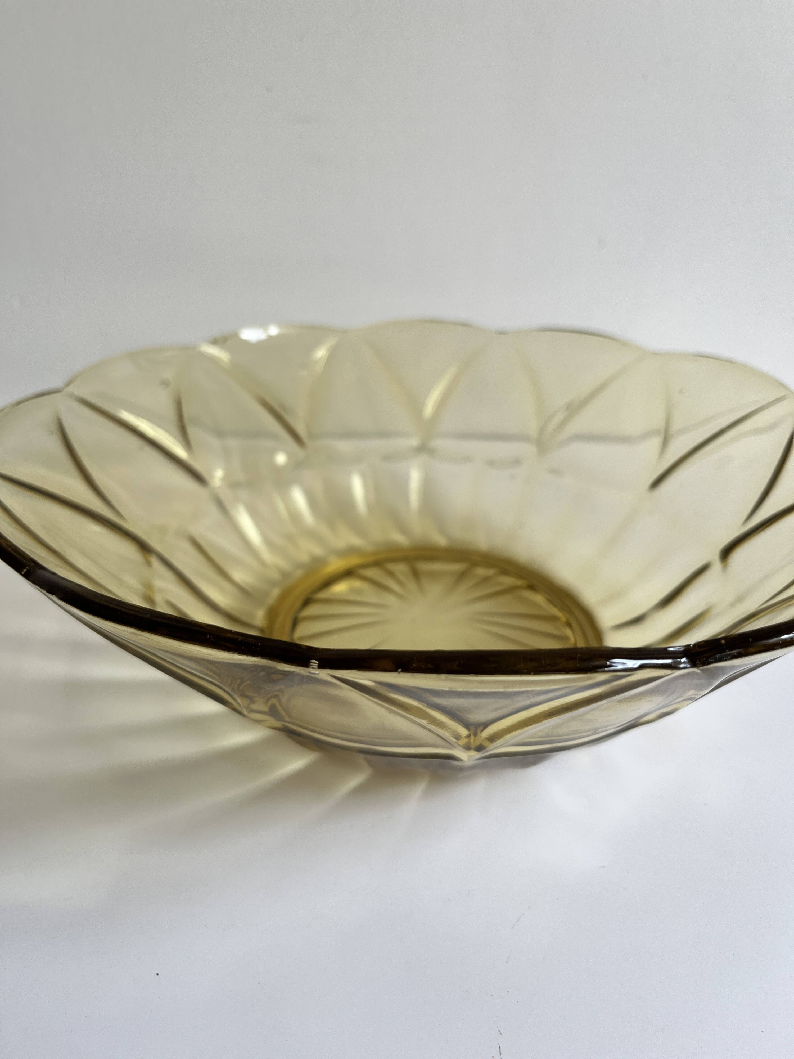 Yellow glass salad bowl