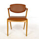 Four Kai Kristiansen oak chairs with new leather upholstery