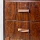 Rosewood chest of drawers with 2 drawers, forming a secretary. 1970s.