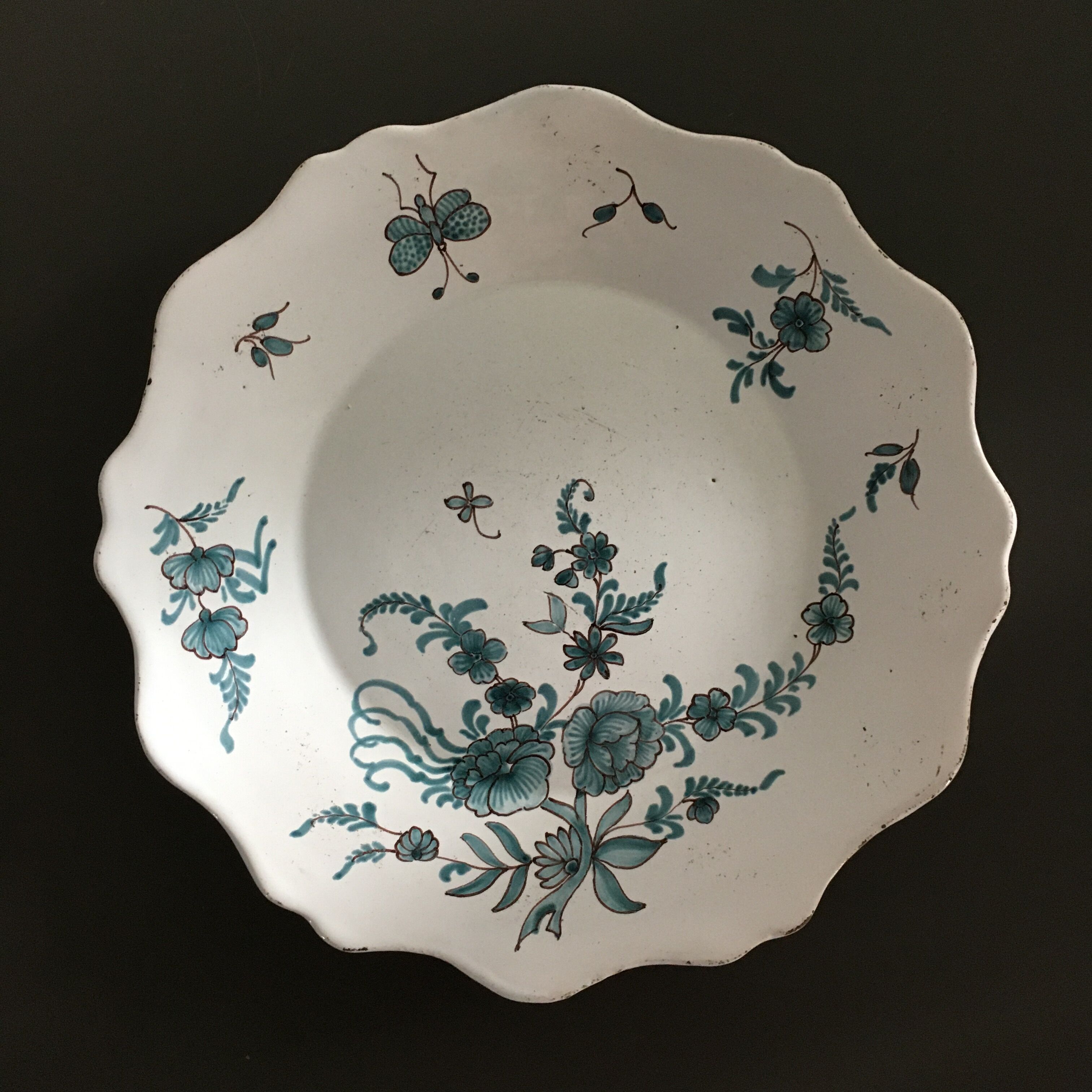 Antique plate with floral decoration