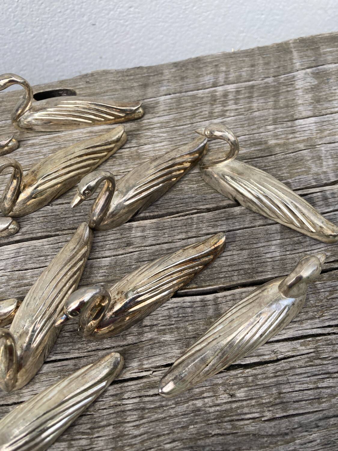 12 duck knife holders in silver metal