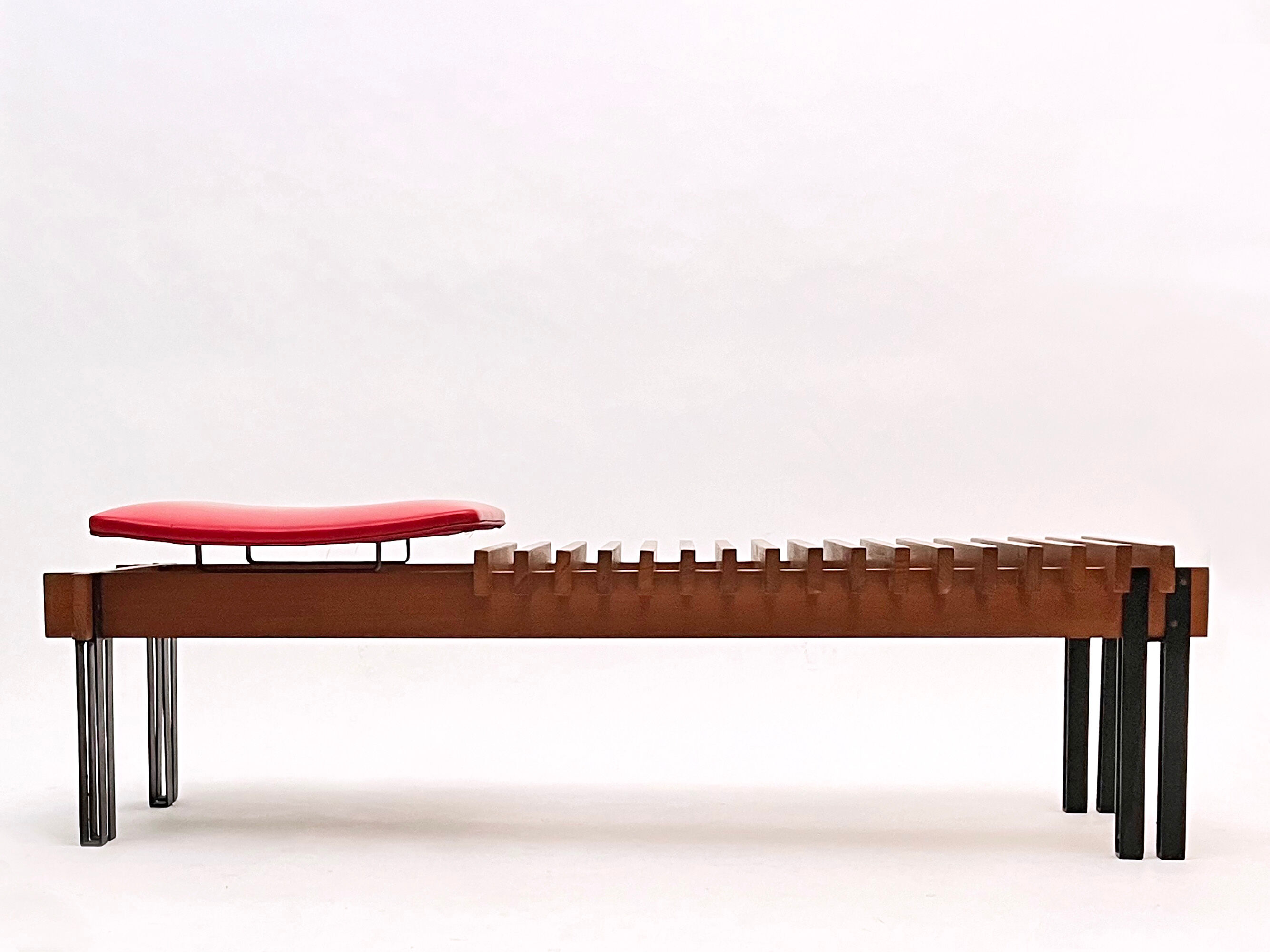 Teak bench designed by Inge and Luciano Rubino for APEC