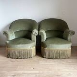 sage green toad armchairs with gold fringe