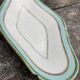 Sausage and porcelain ramekin