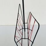 Vintage black metal magazine rack circa 19