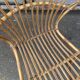 Vintage 1960s rattan shell chair – an icon of bohemian design.