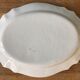 Flat oval islettes decorated with rooster 19th