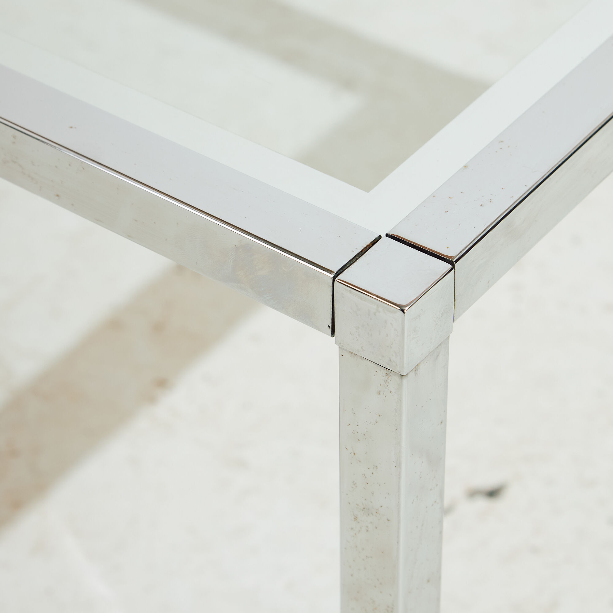 Chrome and glass coffee table.