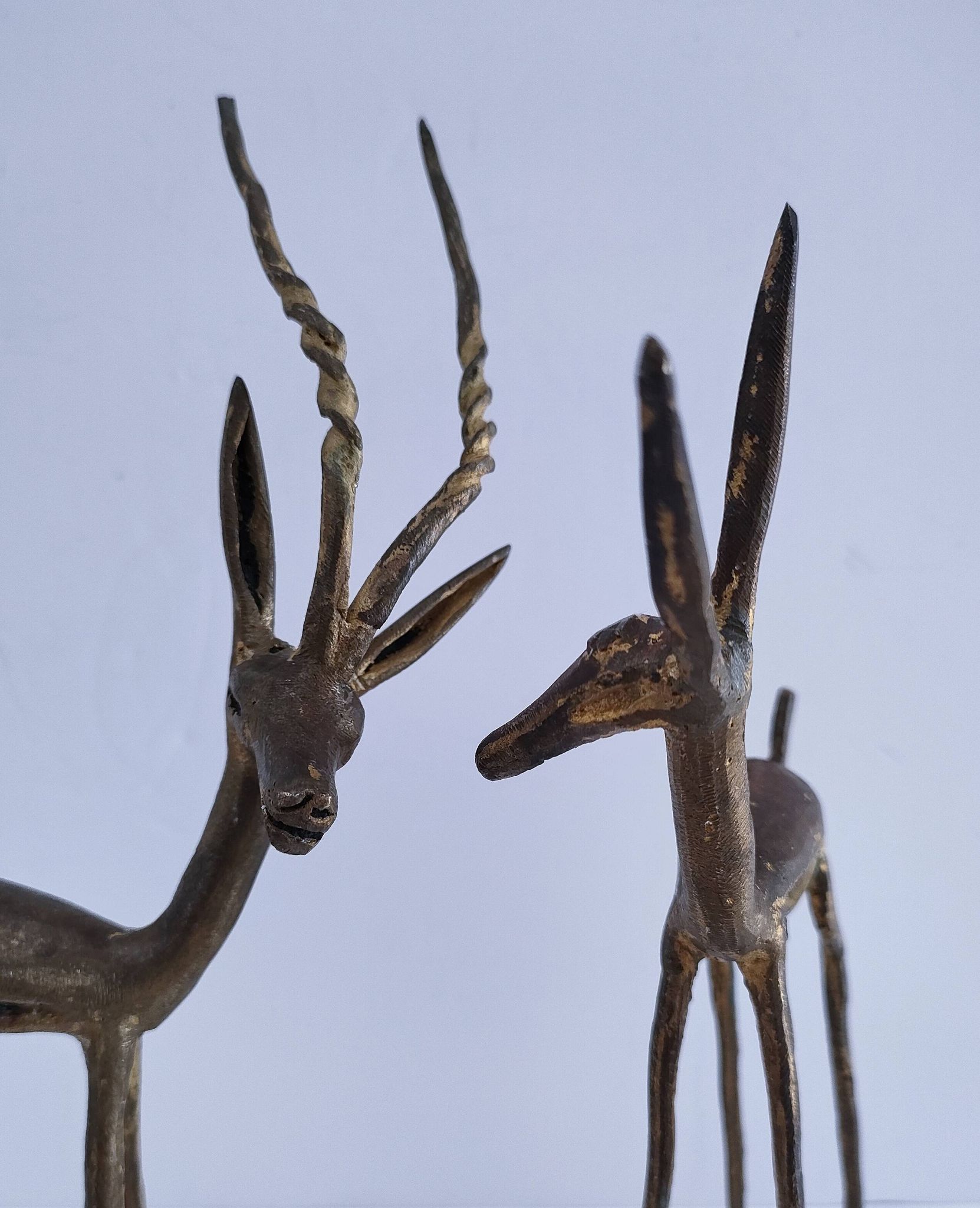 four vintage brass gazelle antelope sculptures