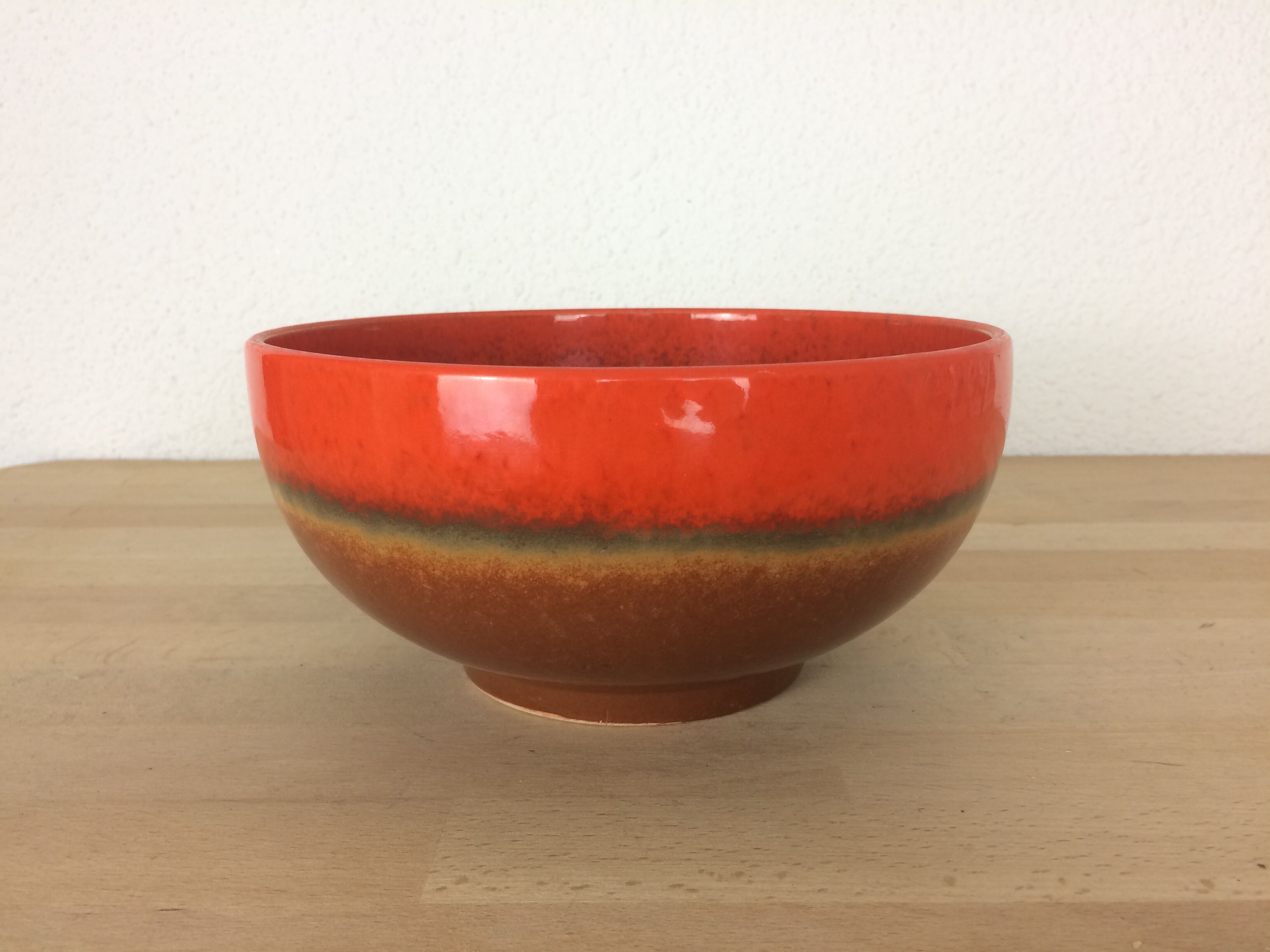 Orange and brown ceramic salad