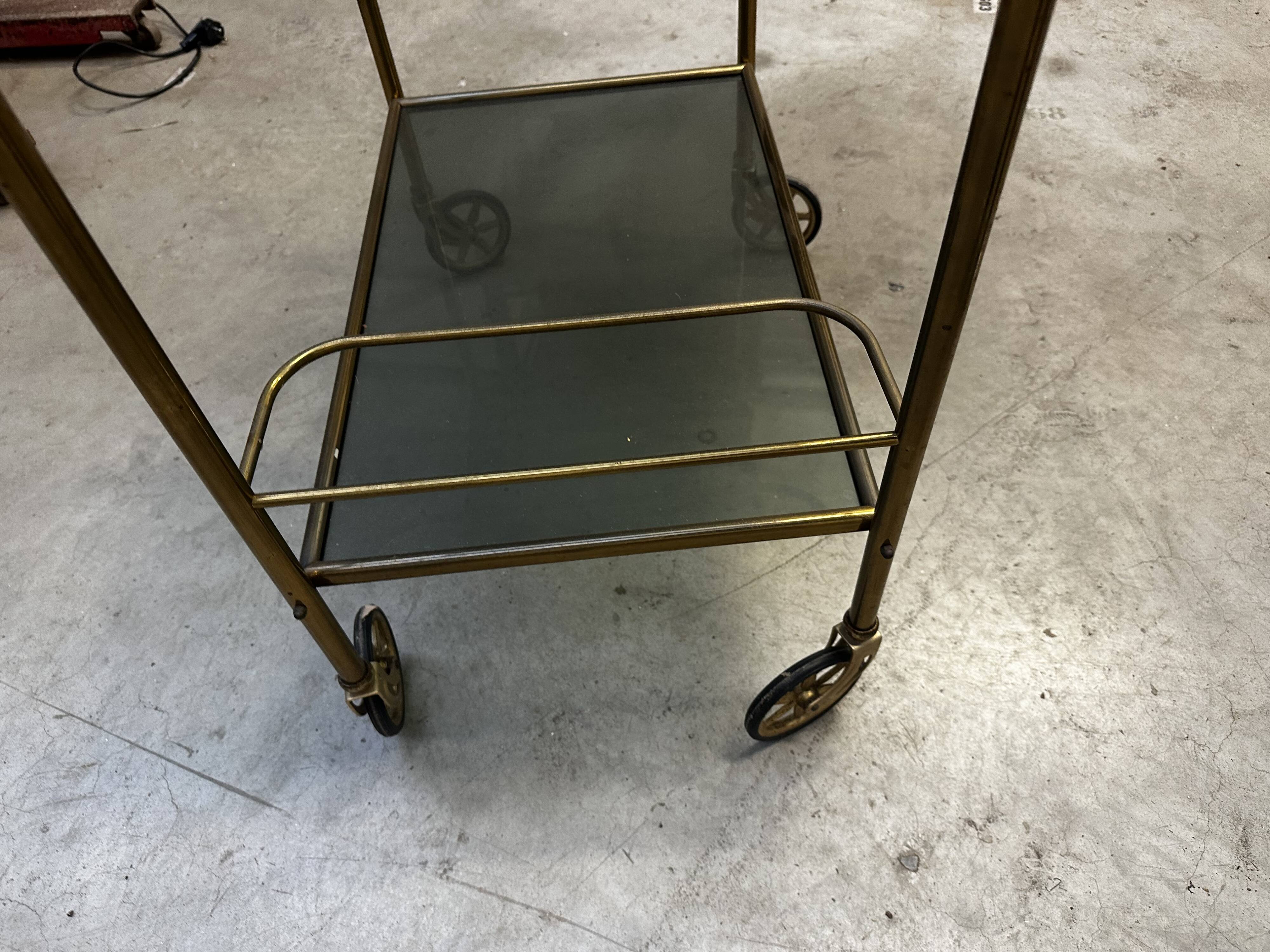 Vintage 70s serving trolley in gold metal and smoked glass