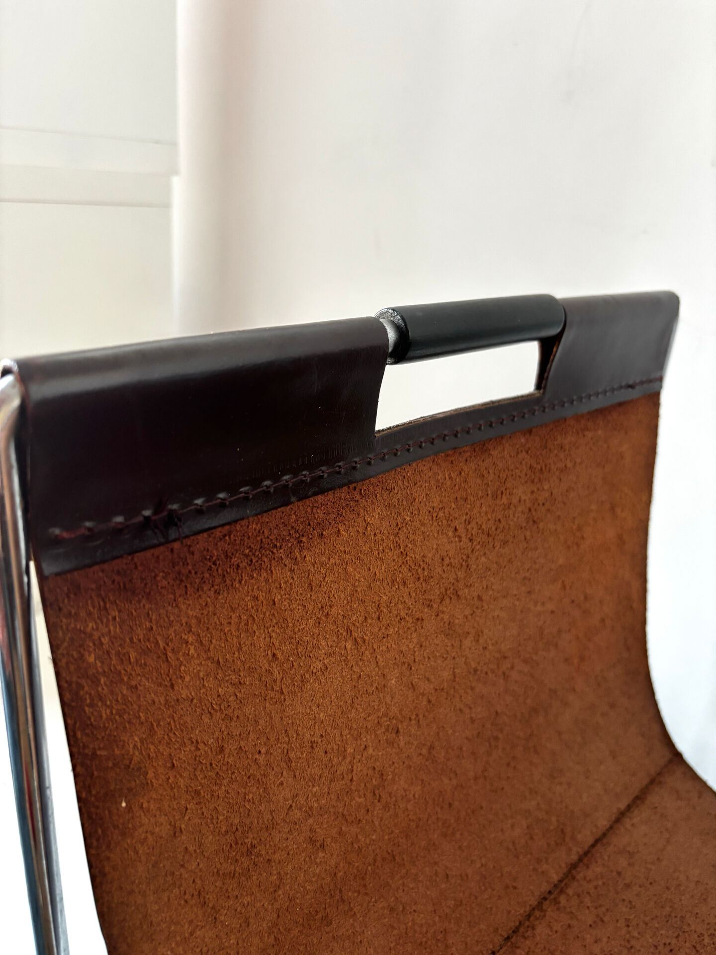 Leather and chrome magazine rack Brabantia