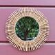 Vintage rattan sun mirror