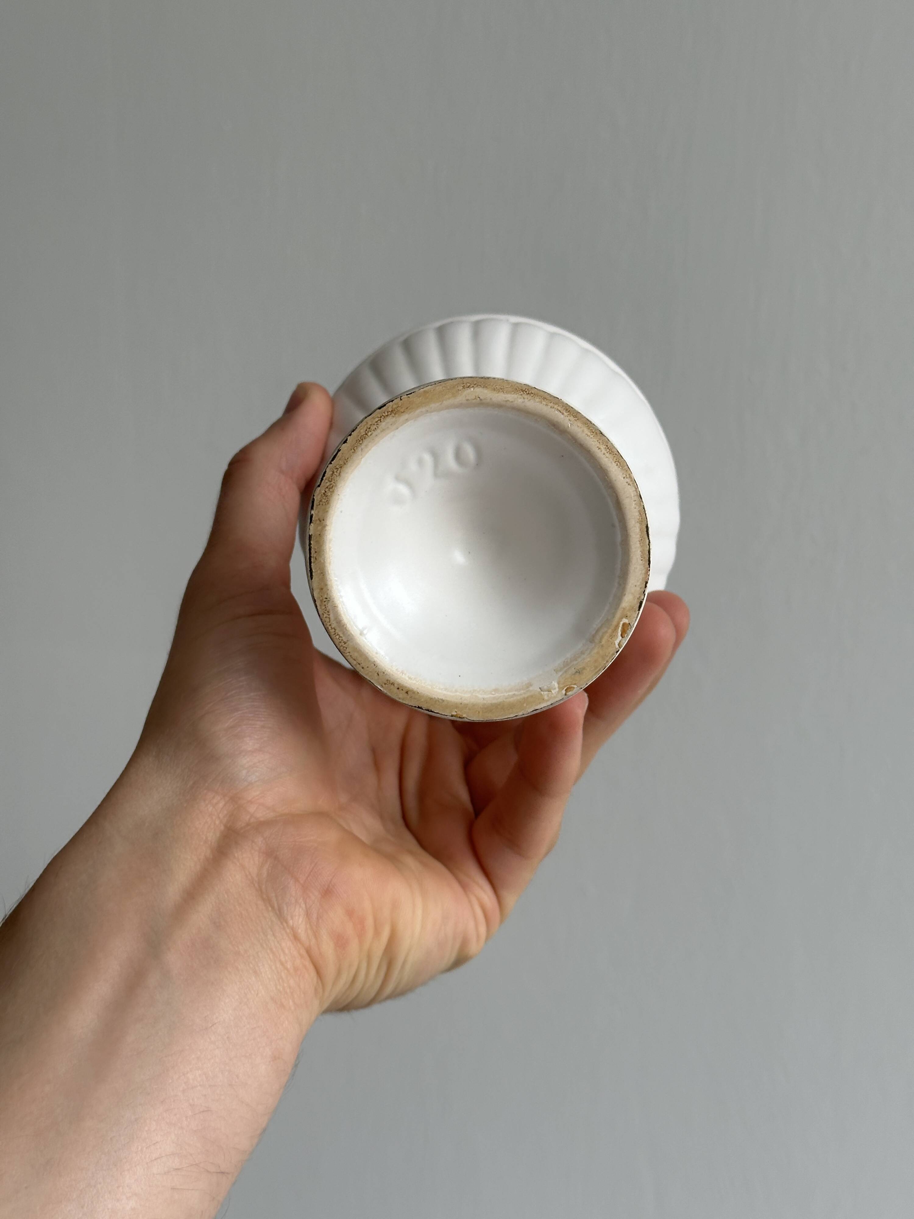 Off-white ceramic footed bowl