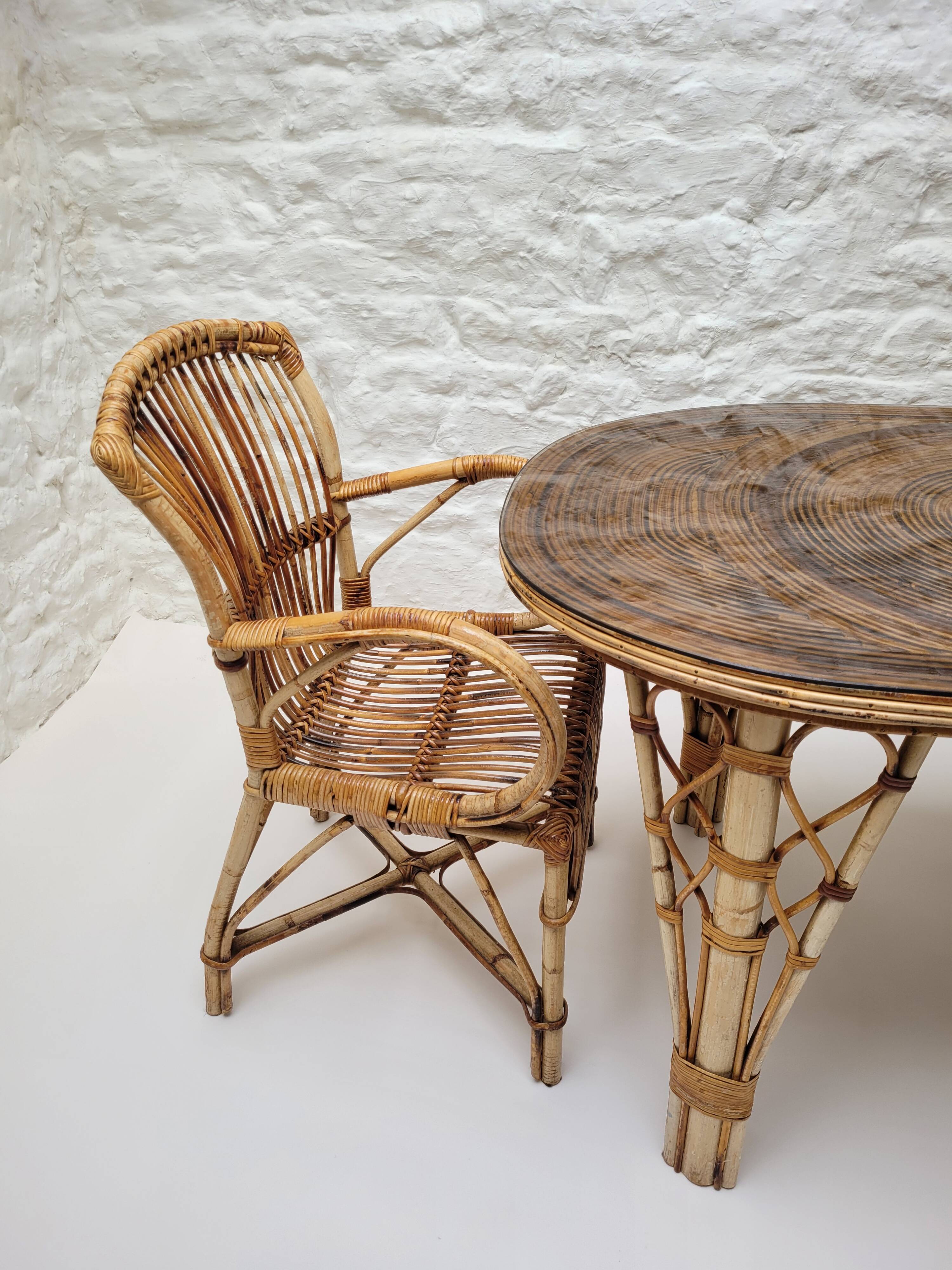 Vintage Audoux Minet bamboo, rattan, and smoked glass table duo.