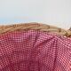 Basket in vintage woven wicker and red gingham