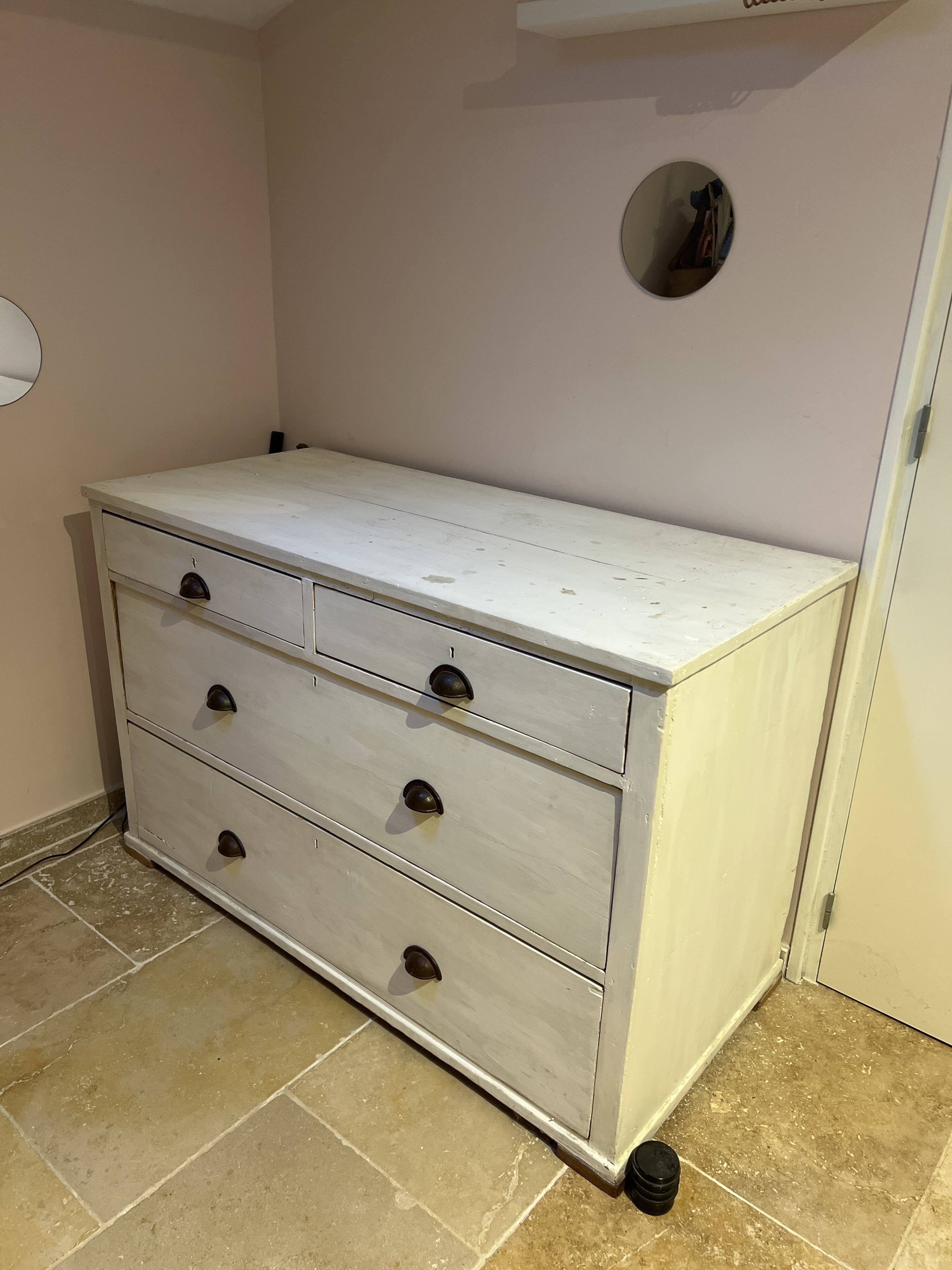 Sturdy antique sideboard with solid wood and drawers.