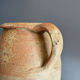 Large earthen pot or jug turned
