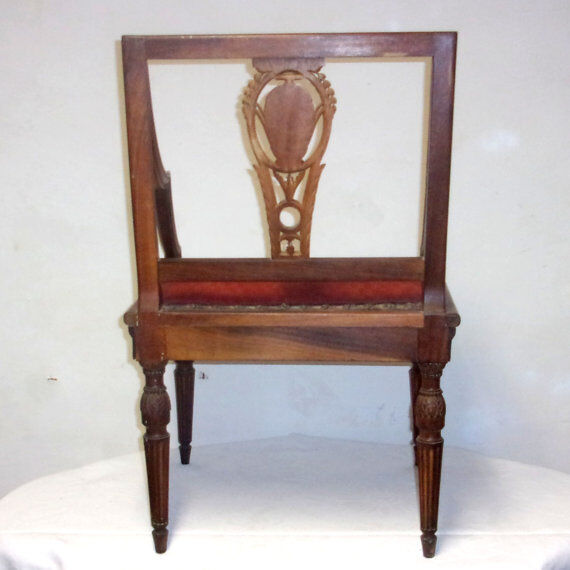 A Chair from the beginning of the 20th century in natural wood.