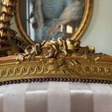 Pair of late 19th-century gilded wooden beds in Louis XVI style.