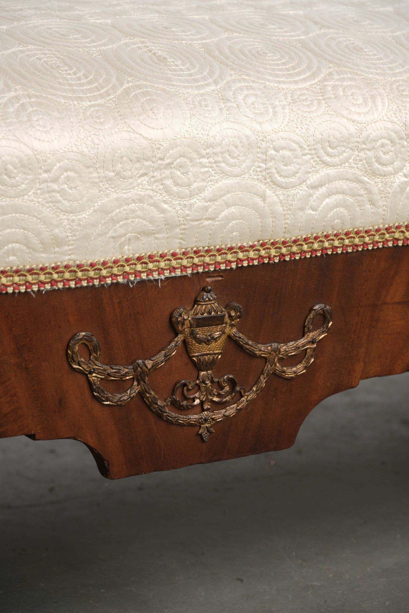 Antique French sofa from the 19th century in Empire style with a silk seat