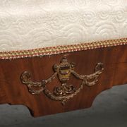 Antique French sofa from the 19th century in Empire style with a silk seat