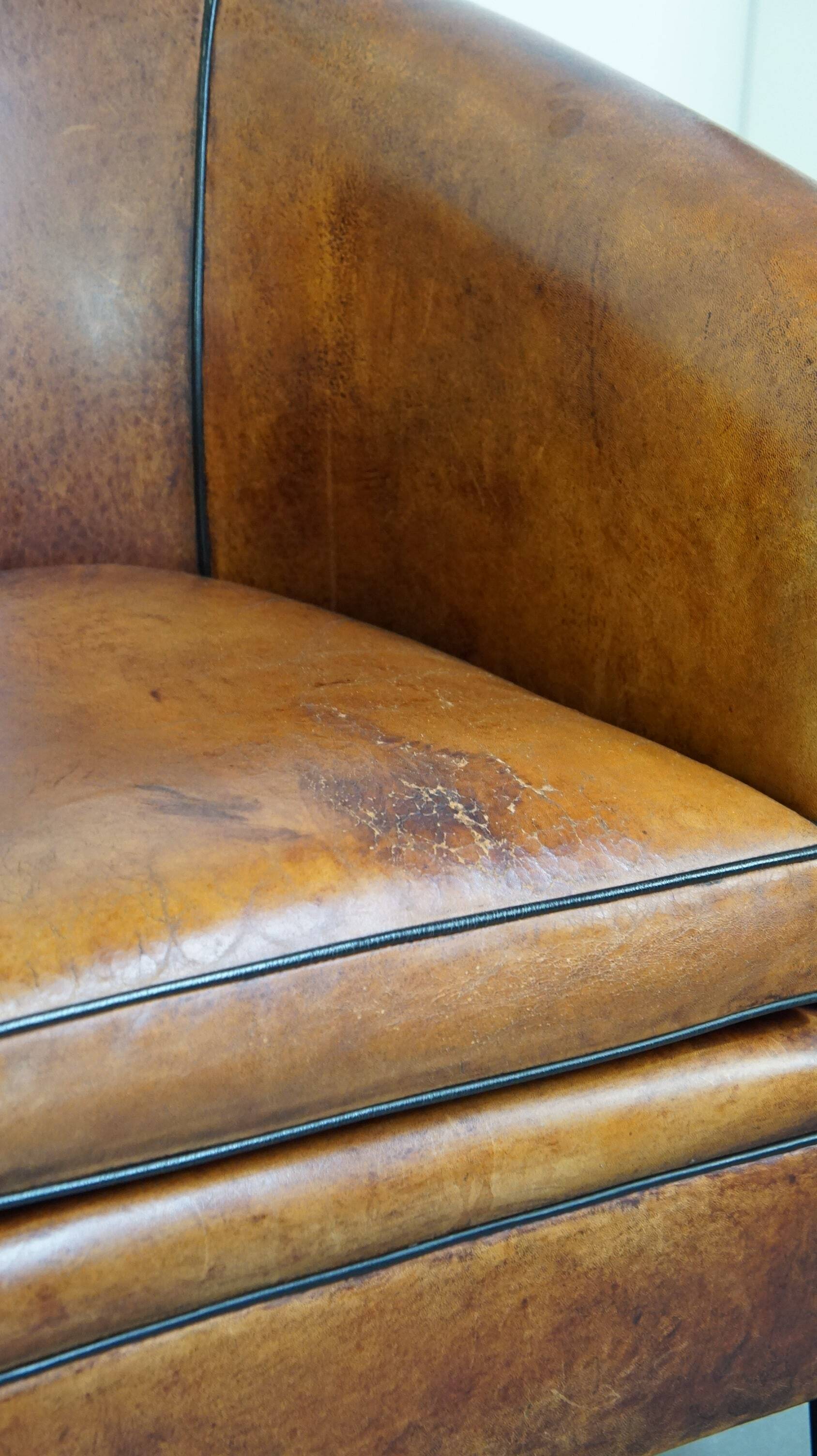 Fauteuil club vintage en cuir de mouton