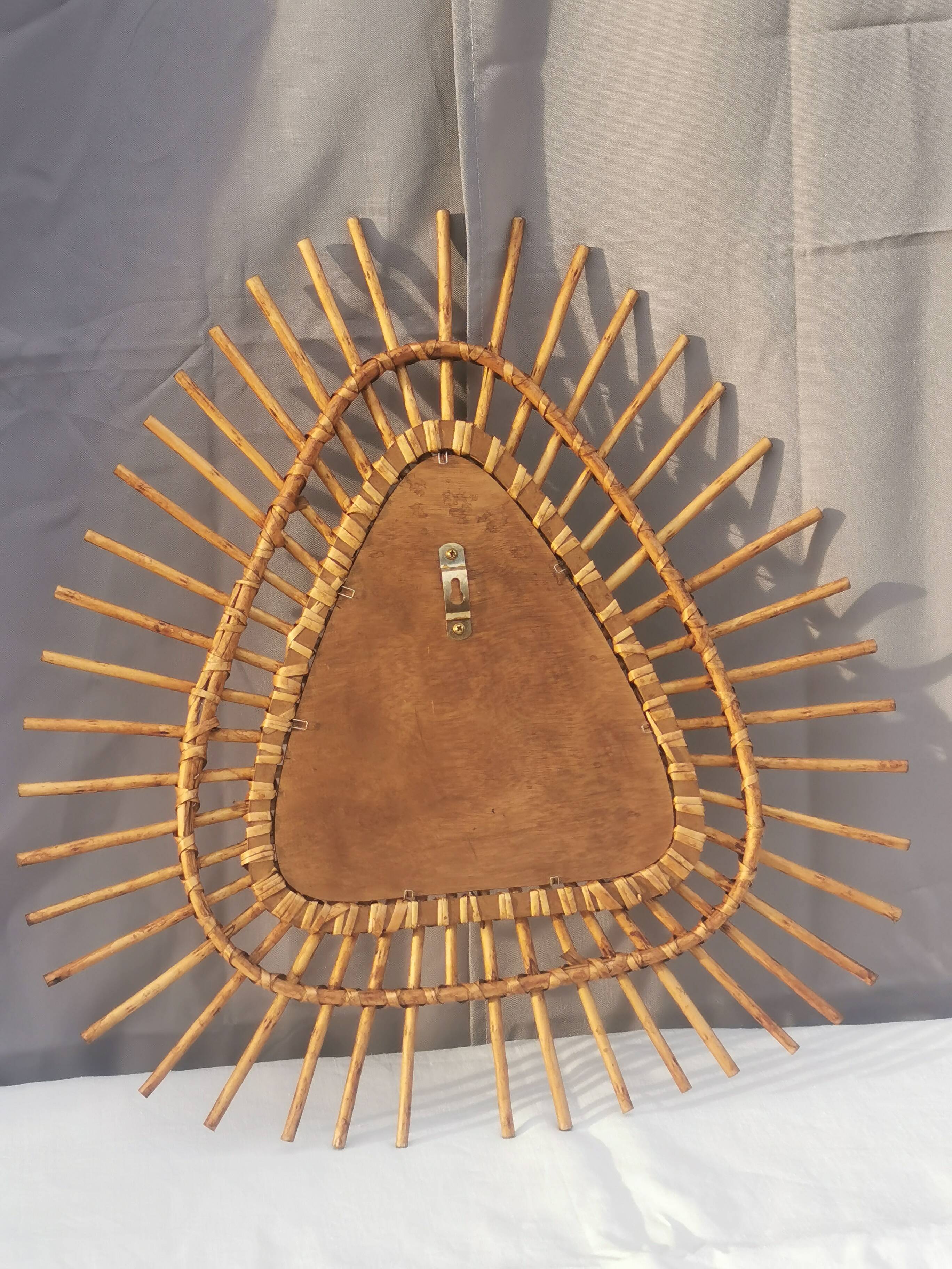 Vintage “rattan” wall mirror