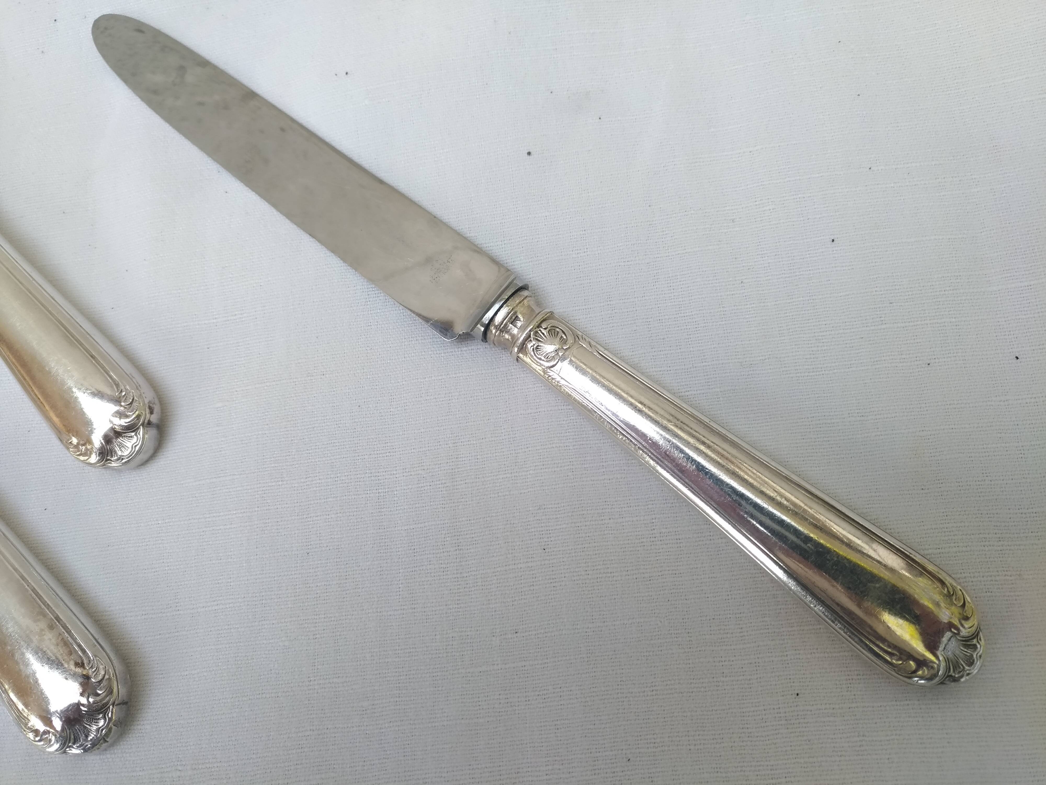 silver metal meat knives